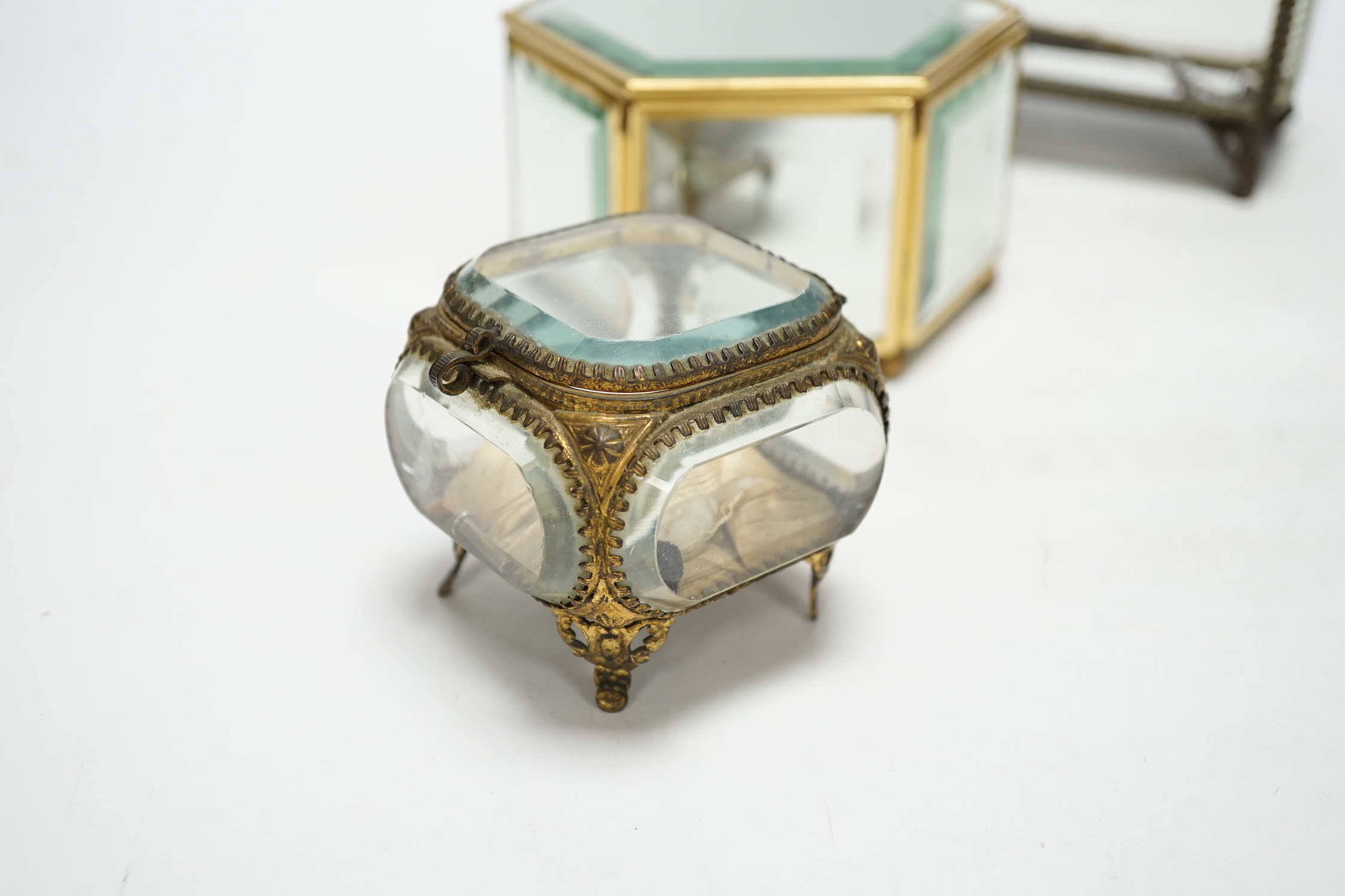 Three bevelled glass trinket boxes, tallest 15cm